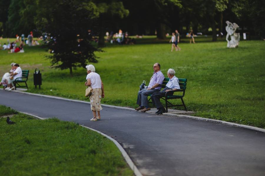 Older residents on a park bench